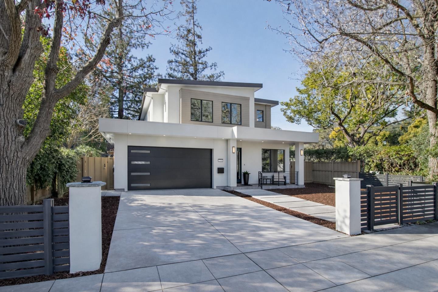 2200 Saint Francis Drive, Palo Alto — a home built in 2025, seen from the street past its gate