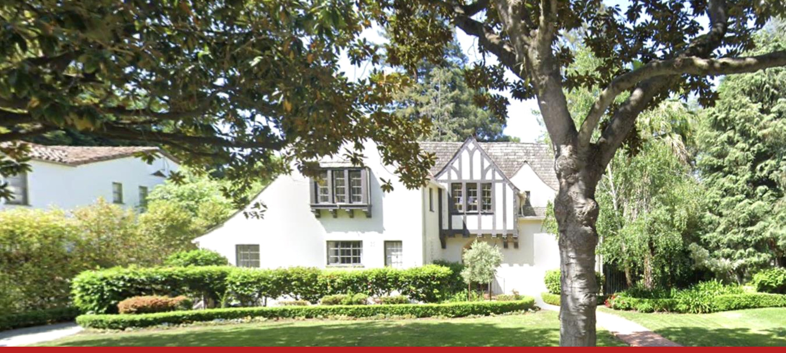 A Palo Alto house on East Crescent Drive, under its magnolia