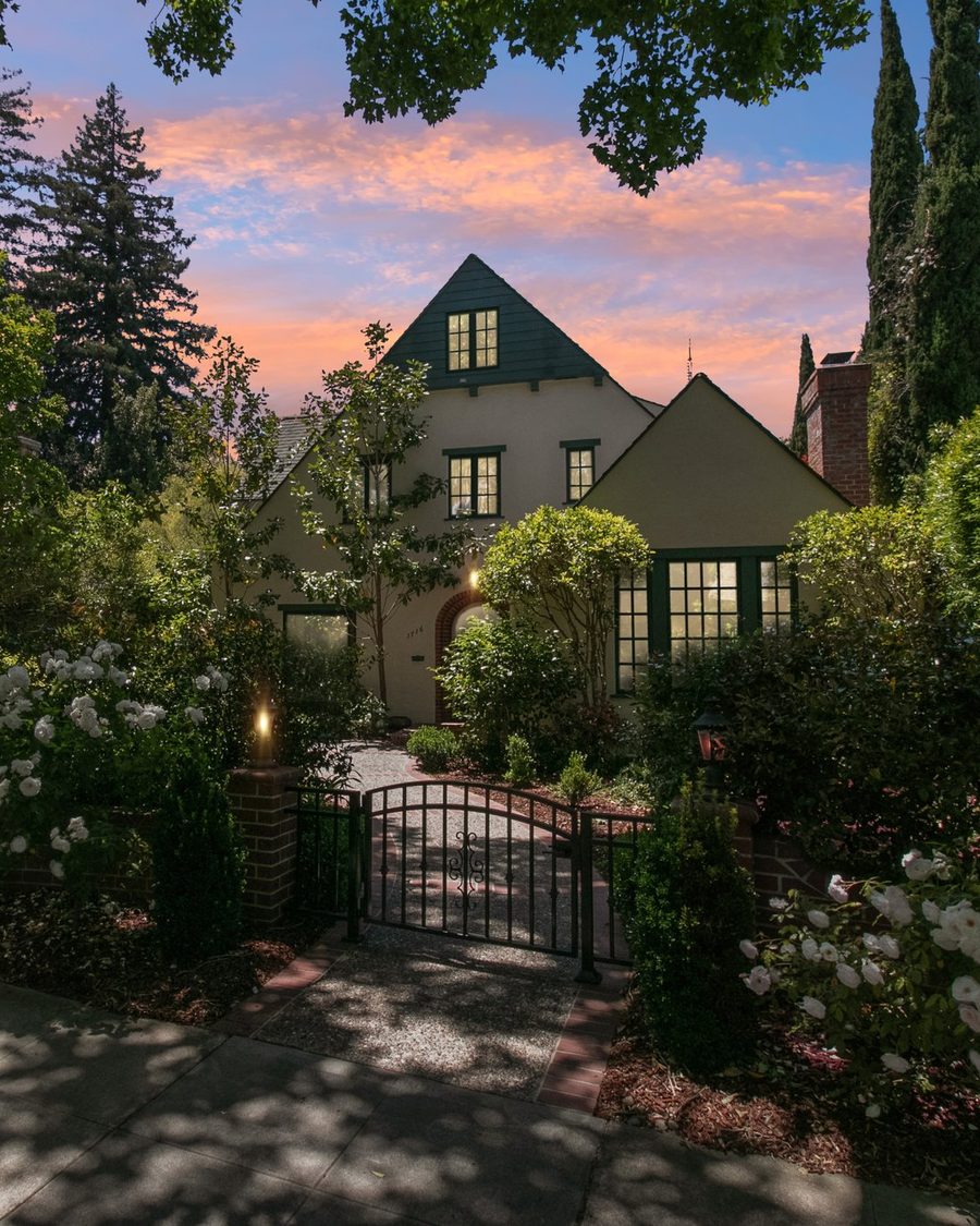 1716 Fulton Street, Palo Alto — a 1930s home behind its garden gate at dusk